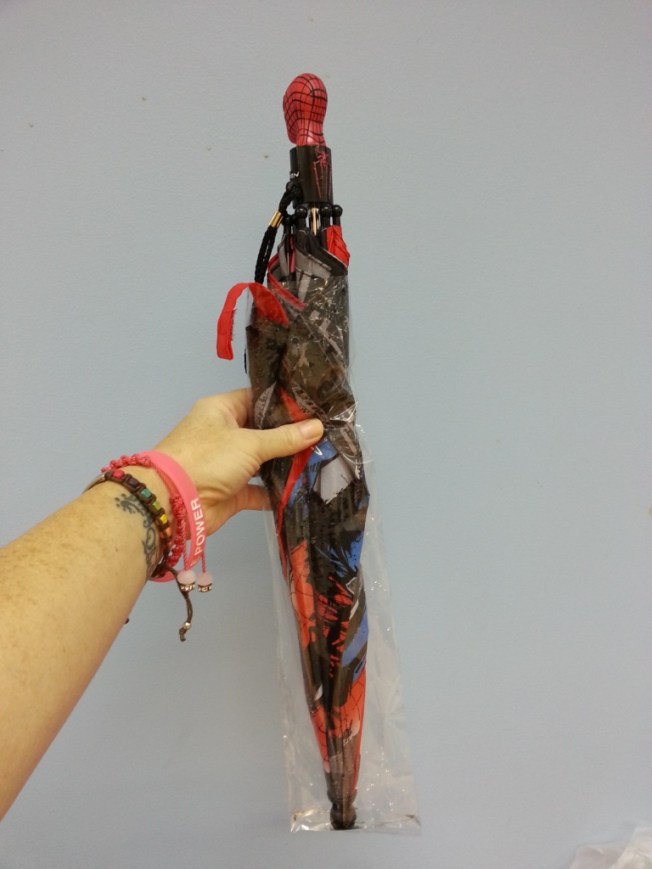 A handy plastic bag for your wet umbrella!
