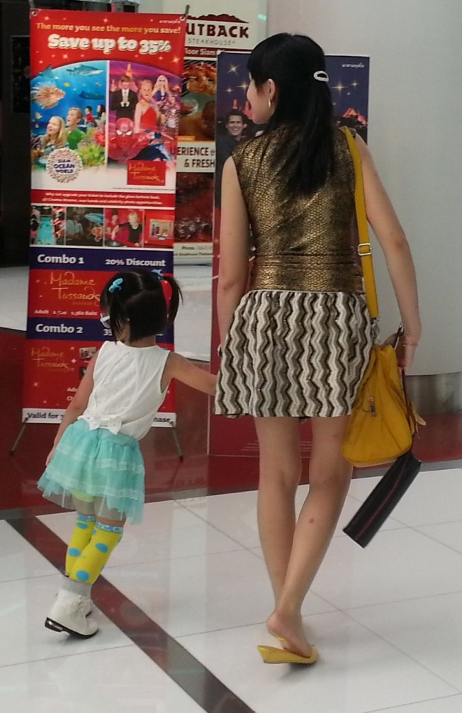Mother and daughter dressed for shopping