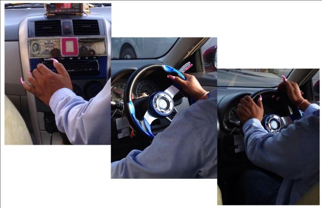 Check out the nails on this taxi guy! (Photographed by Thereka)